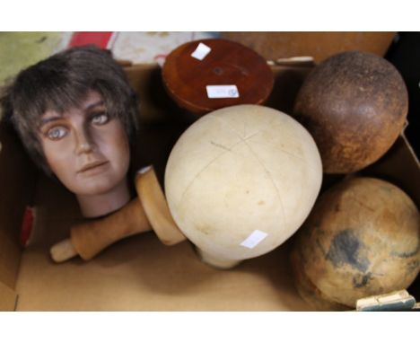 A collection of various heads to include a Milliners head block on a stand, a wig stand? with a painted face, a wooden stand 