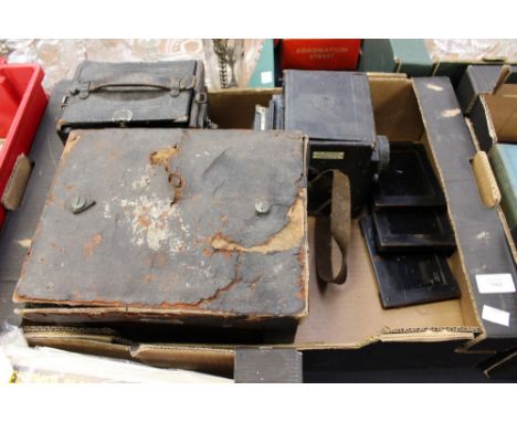 Three vintage cameras to include: a Compact-Graflex camera, The Eastman Company (Kodak) mahogany camera and a Rada 'The Westm