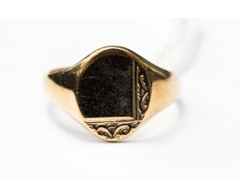A 9ct gold signet ring, with an oval mount, size S, with a total gross weight of approx 4.8gms