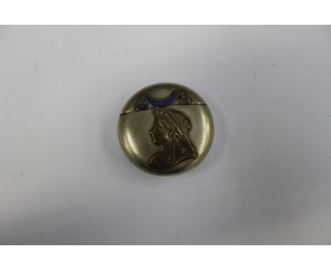 A Victorian Royal diamond jubilee Commemorative white metal, brass and enamel circular vesta case, with brass relief depictin
