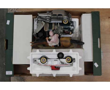 A model of a racehorse and jockey; together with three model cars and a motorcycle (one box) 