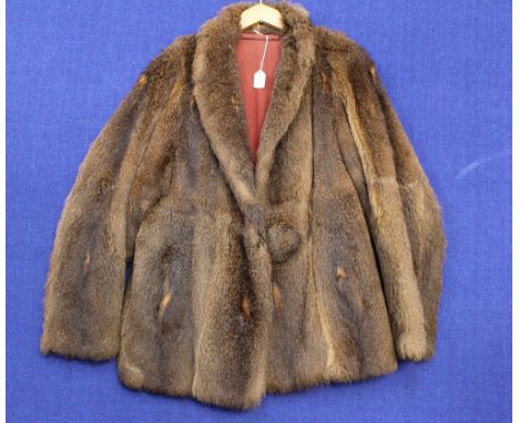 A fox fur jacket, 1940's with self colour button, needs repair to seam underarm