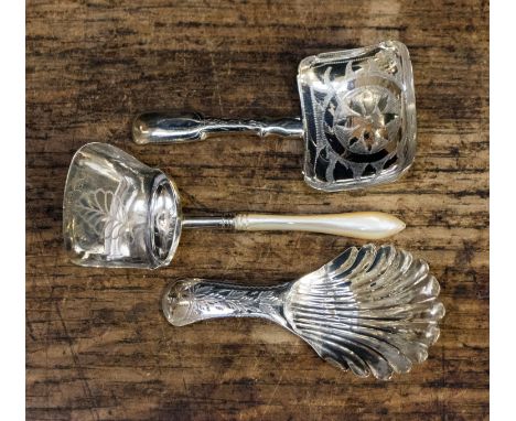 Three George III silver tea caddy spoons, Birmingham 1829 Taylor and Perry, Birmingham indistinct date Unite and Hilliard and