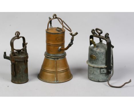 Three vintage miners lamps one named The Premier Lamp made by Crestelia &amp; Engineering Co. Ltd another made by Coal Salt &