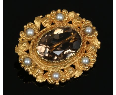 A 9ct gold smokey quartz and pearl brooch of ovoid form.