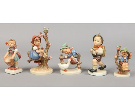 Five Goebel M. J. Hummel figures.