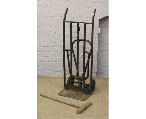 A vintage porters barrow, purportedly of G.N.E.R origin, along with a rail hammer.