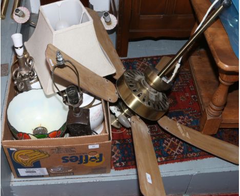 A five branch ceramic ceiling light along with a ceiling fan and a box of tablelamps.