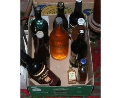 A collection of bottled alcohol to include Cognac, Sherry etc.