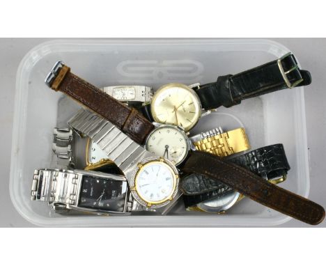 A box of manual quartz and digital watches some in need of repair.