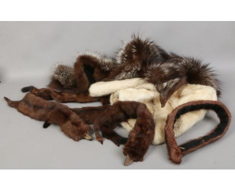 A collection of furs to include stoles, coat collars, fur wraps etc.