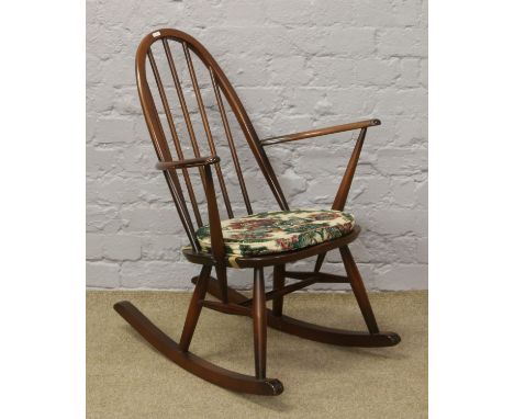 An Ercol spindle back rocking chair.