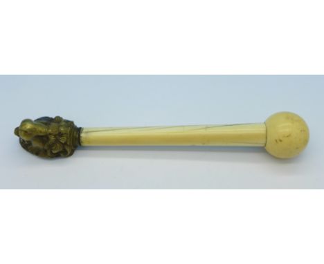 An ivory cosh or hammer with brass finial, 21cm