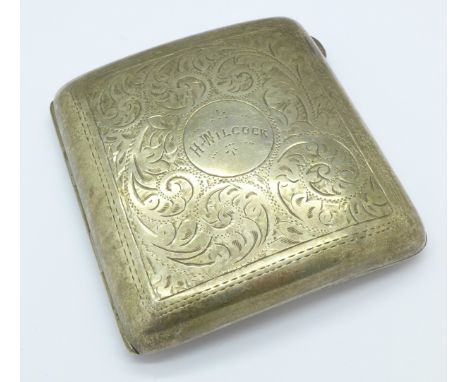 A chased silver cigarette case, 112.8g