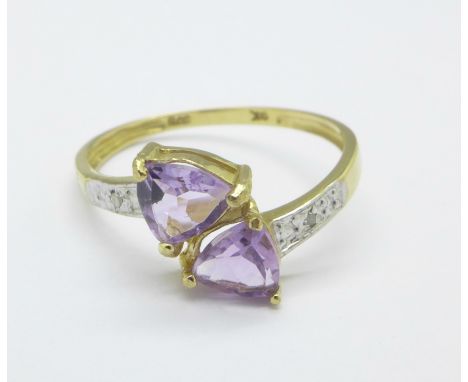 A 9ct gold, amethyst and diamond ring, 1.2g, O