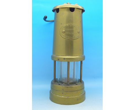 A Lamp & Limelight miner's safety lamp