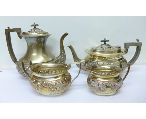 A four piece silver tea service, Birmingham 1903, teapot with replacement finial, 1919g, 61oz