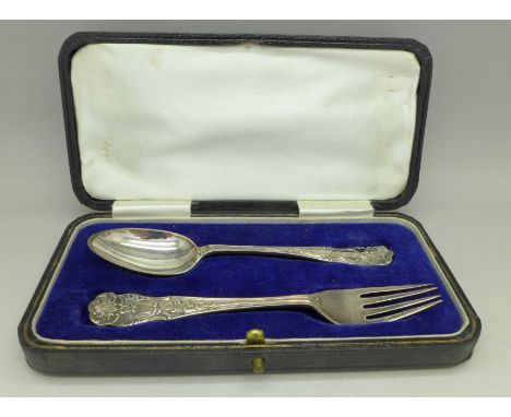 A silver knife and fork set, boxed, 46g