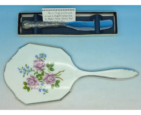 A silver handled knife, boxed and a silver plated mirror with enamel back, enamel a/f