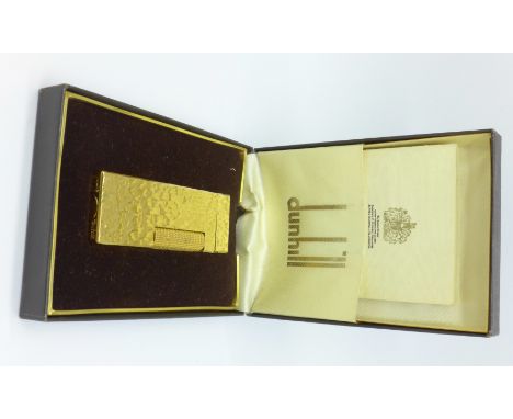 A Dunhill lighter, boxed