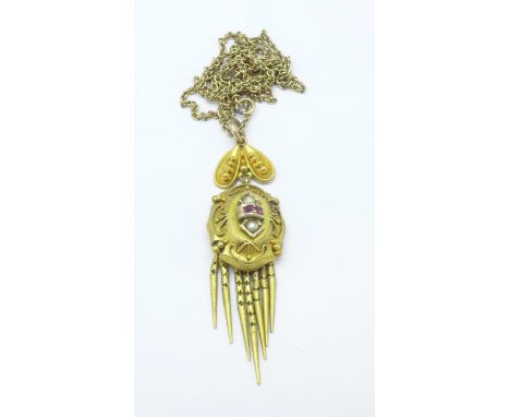A Victorian ruby and pearl set tassel pendant, tests as 18ct, 2.5g, on a yellow metal chain, 1.8g