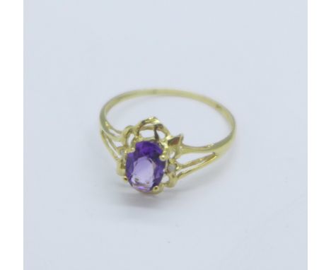 A 9ct gold, amethyst and diamond ring, 1g, O