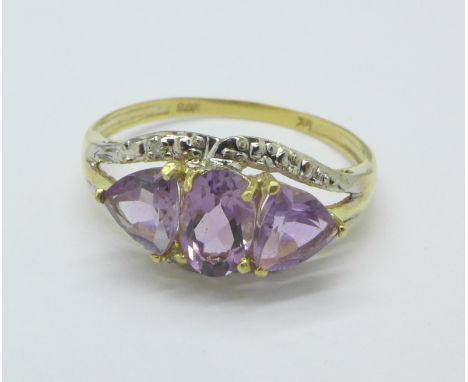 A 9ct gold, amethyst and diamond ring, 1.4g, O