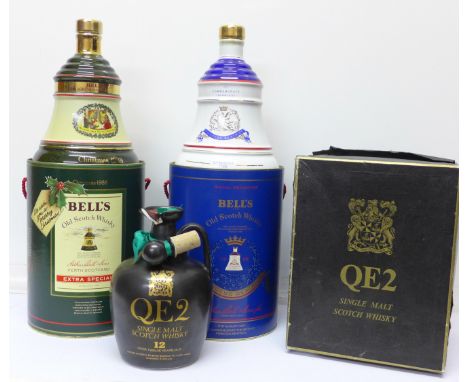 Two Bell's Old Scotch Whisky decanters, sealed with contents and a Queen Elizabeth II single malt scotch whisky, sealed, deca