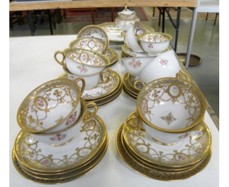 A NORITAKE RAISED GILT AND TURQUOISE JEWELLED TEA SERVICE PAINTED WITH SWAGS AND MEDALLIONS OF ROSES AND BLUE FLOWERS