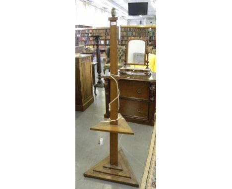 AN ART DECO OAK TRIANGULAR STANDARD LAMP