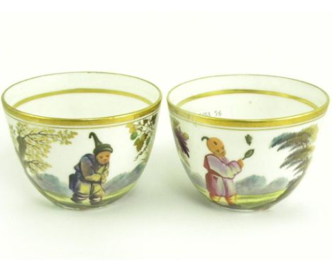 A PAIR OF FIRST PERIOD MINTON TEACUPS OF BUTE SHAPE PAINTED WITH CHINESE FIGURES, PAINTED MARK, M AND 539, EARLY 19TH CENTURY