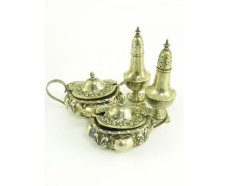 A PAIR OF EDWARD VII SILVER EMBOSSED OBLONG MUSTARD POTS, BIRMINGHAM 1905 AND 1906, A PAIR OF SILVER MUSTARD SPOONS AND A PAI