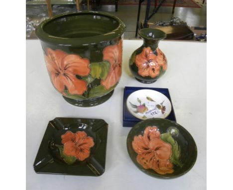 A MOORCROFT HIBISCUS JARDINIERE VASE, BOWL AND ASHTRAY ALL WITH GREEN GROUND AND A ROYAL WORCESTER ARDEN PATTERN PIN TRAY, BO