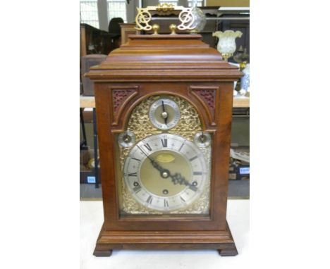 A GEORGE III STYLE GILT BRASS MOUNTED WALNUT BRACKET CLOCK AND BRACKET BY F.W. ELLIOTT, LONDON, CIRCA 1980