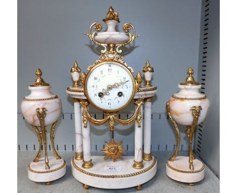 A Louis XVI style 3 piece clock garniture in white marble and ormolu, the central clock with vase finial, white enamel dial d