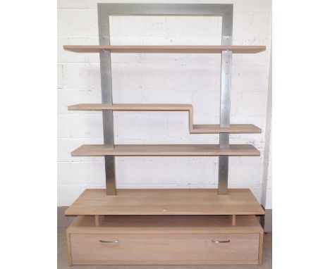 A modern brushed metal and limed light oak geometric wall unit