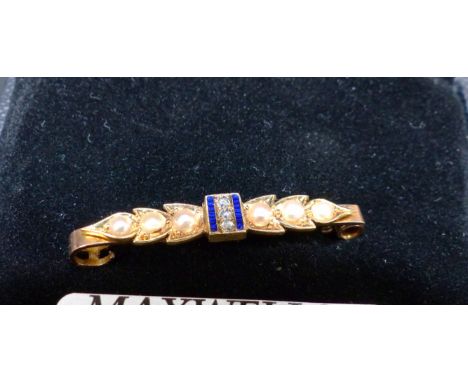 A 9 carat hallmarked gold brooch set seed pearls, diamond chips and blue enamel, 3.5 gm