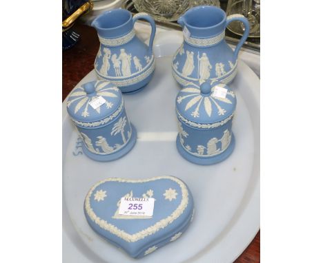 A pair of blue Wedgwood Jasperware cylindrical pots, 5"; a pair of similar jugs; a heart shaped trinket box