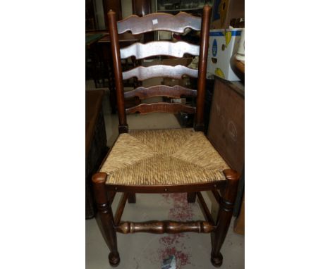A set of 6 early 20th century ladder back chairs with rush seats