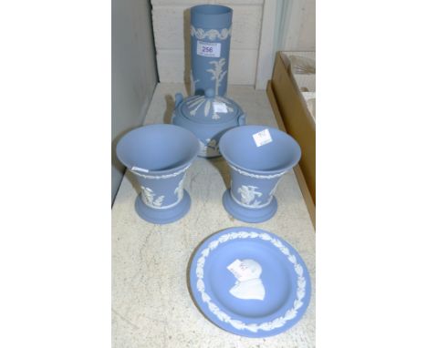 A Wedgwood Jasperware pin tray and a cameo portrait of Winston Churchill; a pair of posy vases, a cylindrical vase and a cove