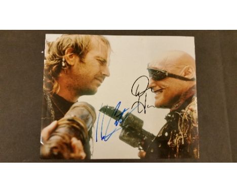 CINEMA, signed colour photo by Dennis Hopper & Kevin Costner, 10 x 8 scene from Waterworld, stained to back, VG