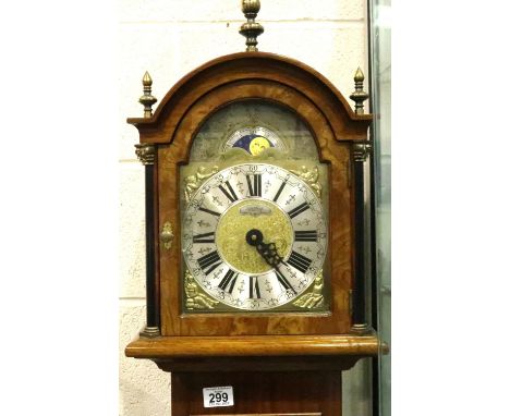 Medium sized Grandmother longcase clock, oak cased and weight driven with silvered and gilt dial and moon phase aperture. Not