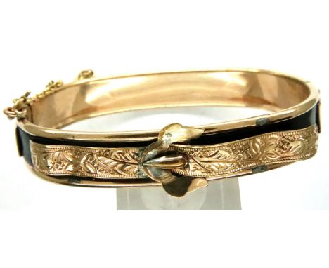 Yellow metal bangle, possibly gold?, with safety chain. P&amp;P Group 1 (£14+VAT for the first lot and £1+VAT for subsequent 