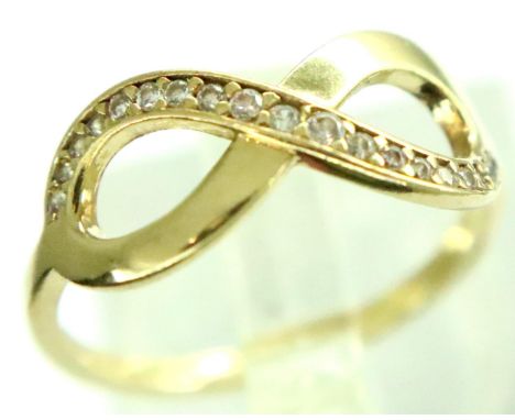 Yellow metal infinity ring set with white stones, size M, 1.0g. P&amp;P Group 1 (£14+VAT for the first lot and £1+VAT for sub