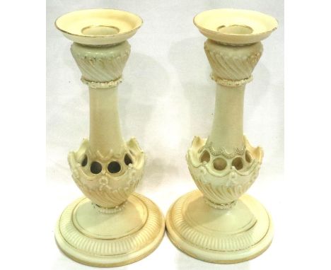 Pair of Royal Worcester candlesticks in the Blush Ivory pattern, model 1236, H: 21 cm. Some wear to gilt, otherwise no cracks