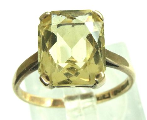 9ct gold and large emerald cut citrine solitaire ring, size M, 2.8g. P&amp;P Group 1 (£14+VAT for the first lot and £1+VAT fo