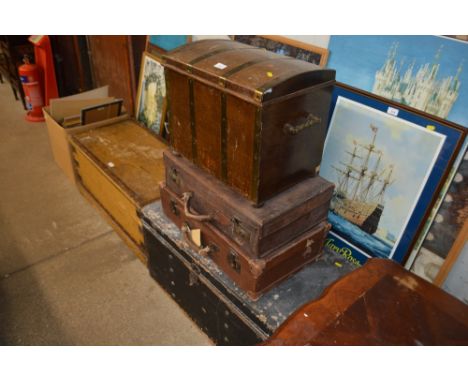 Two suitcases; a wooden and brass bound chest; and a travelling trunk