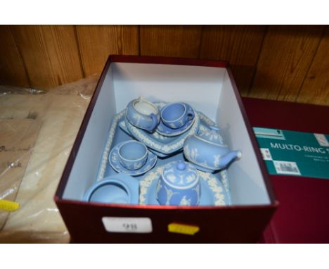 A tray of small Wedgwood jasperware items to include pin dishes, miniature teapots, cups and saucers etc.