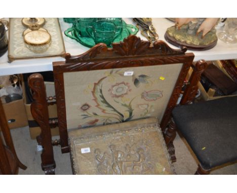 An embroidered firescreen 