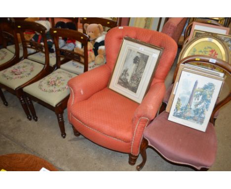 A Victorian and upholstered button back armchair 